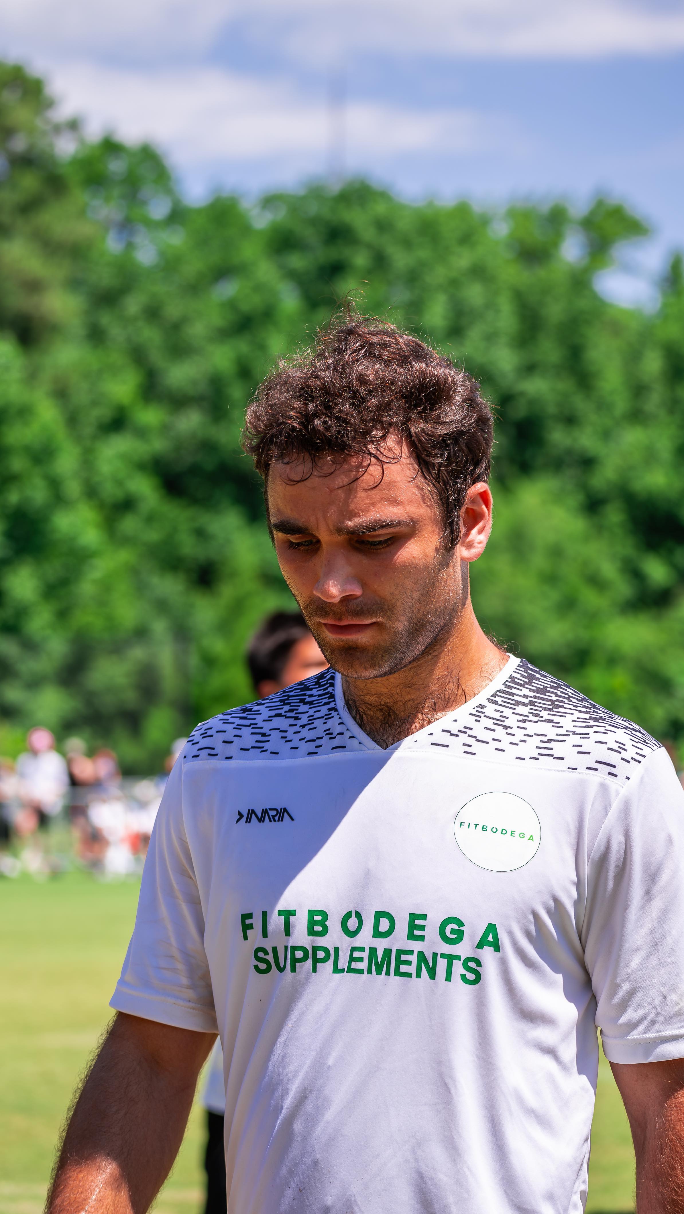 FitBodega Vancouver FC player in the white FitBodega Supplements away kit — watch the reel