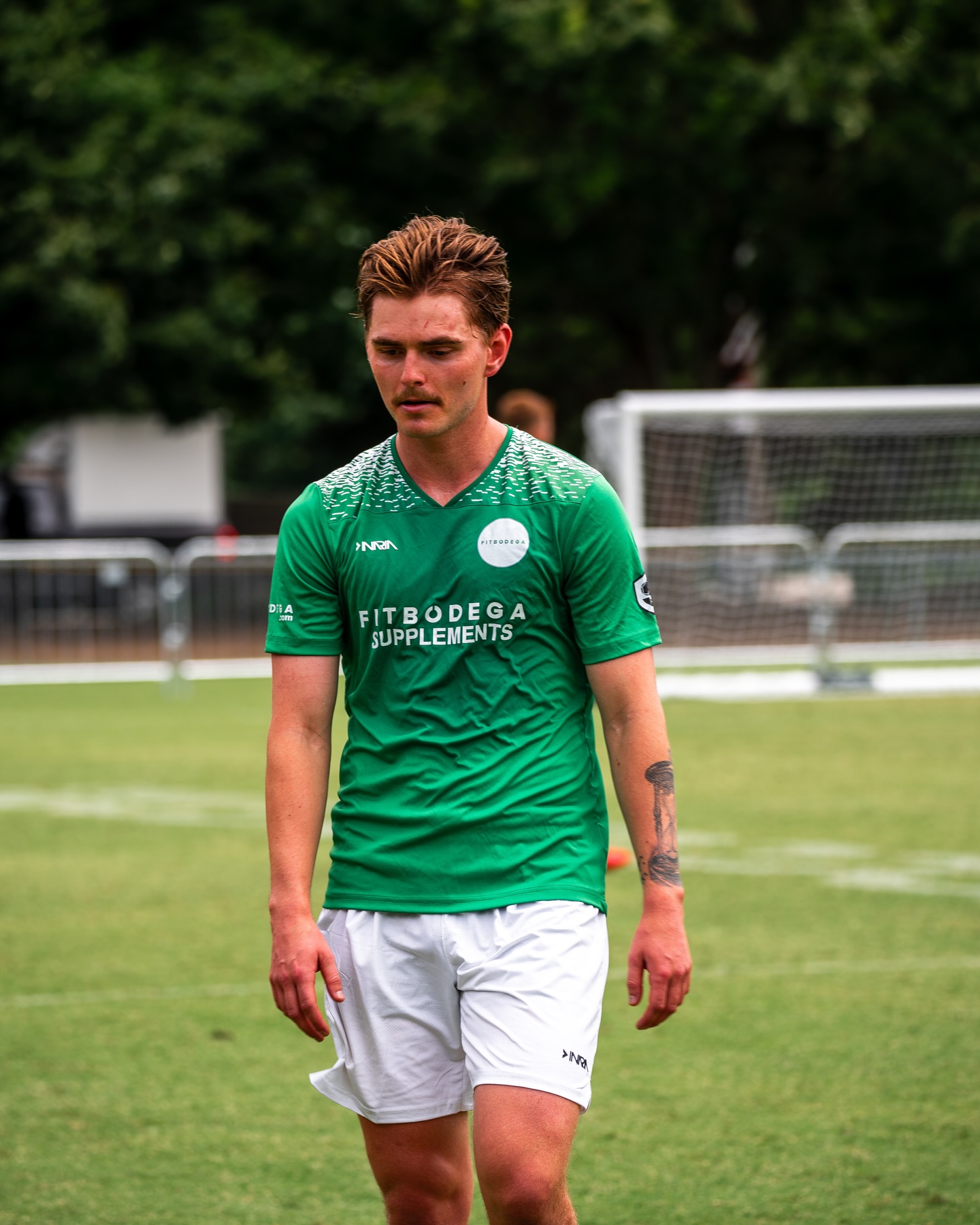 FitBodega Vancouver FC player in the green FitBodega Supplements kit at The Soccer Tournament